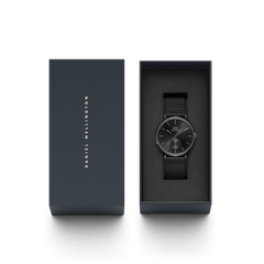 Classic Multi-Eye Ashfield Onyx watch with a black mesh strap presented in an elegant Daniel Wellington gift box.