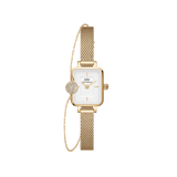 Quadro Mini & Pavé Crystal Gold Set featuring a petite rectangular gold watch with a white dial and fine mesh strap, paired with a delicate gold bracelet adorned with a pavé crystal charm.