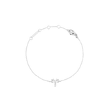 Delicate silver chain bracelet with an adjustable fit, featuring an Aries zodiac charm adorned with sparkling cubic zirconia crystals.