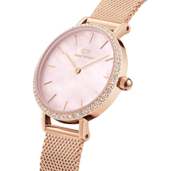 Petite Lumine Bezel Melrose Pink MOP watch with a pink mother of pearl dial, crystal-set bezel, and an elegant rose gold mesh strap, shown in a close-up angled view highlighting its refined detailing.