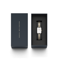 Quadro Lumine 5-link two-tone women’s watch with gold and silver bracelet, presented in a Daniel Wellington gift box.