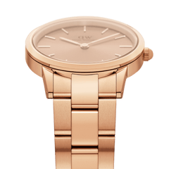 Daniel Wellington Iconic Link Unitone Rose Gold women’s watch with brushed link bracelet and minimalist rose gold dial.