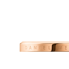 Close-up of the Classic Ring Rose Gold by Daniel Wellington, highlighting the engraved branding on the polished rose gold band.