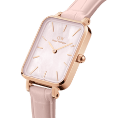Quadro Pressed Rouge women’s watch featuring a rectangular rose gold case, iridescent pink mother of pearl dial, gold detailing, and a nude pink croc-pattern leather strap.