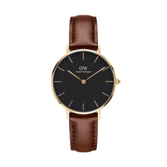 Daniel Wellington Petite St Mawes Gold women’s watch with black dial, gold case, and brown leather strap.