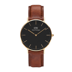 Daniel Wellington Classic St Mawes Gold watch with black dial, gold case, and brown leather strap, minimalist unisex style.