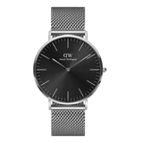 Classic Mesh Onyx watch featuring a black sunray dial, minimalist silver hour markers, and a polished stainless steel mesh strap.