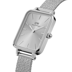 Quadro Pressed Unitone Silver women’s watch with rectangular stainless steel case and silver mesh strap, minimalist style.