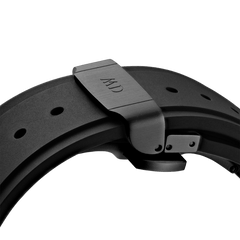 Detail of the Switch Black Black Daniel Wellington Apple Watch case showing the black stainless steel clasp and flexible FKM rubber strap for a secure, comfortable fit.