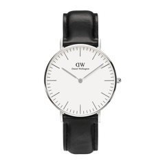 Minimalist silver Daniel Wellington Classic Sheffield watch with white dial and black leather strap, elegant unisex design.