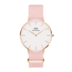 Petite Rosewater Rose Gold women’s watch featuring a minimalist white dial, slim rose gold case, and a delicate pink NATO fabric strap.