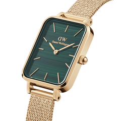 Daniel Wellington Quadro Pressed Evergold women’s watch with gold mesh strap and green rectangular dial, elegant design.