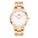 Daniel Wellington Iconic Link Rose Gold watch featuring a polished rose gold stainless steel bracelet and a minimalist eggshell white dial with gold index markers.