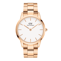 Daniel Wellington Iconic Link Rose Gold watch featuring a polished rose gold stainless steel bracelet and a minimalist eggshell white dial with gold index markers.
