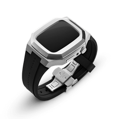 Daniel Wellington Switch Silver Apple Watch case in stainless steel with a geometric bezel, black rubber strap, and open deployment clasp, designed for 40mm Apple Watch models.