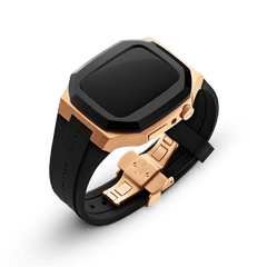 Switch Rose Gold Apple Watch case with a brushed rose gold stainless steel frame, black bezel, black rubber strap, and matching rose gold deployment clasp.