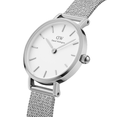 Elegant Petite Pressed Sterling women’s watch with minimalist white dial and silver mesh strap, Daniel Wellington branding.
