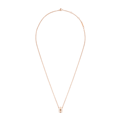 Emalie Necklace in rose gold with an adjustable fine chain and a satin white enamel ring pendant, featuring subtle engraved detailing.