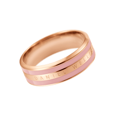 Rose gold ring with a smooth dusty rose enamel inlay, featuring Daniel Wellington engraving and a polished, modern finish.