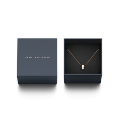 Emalie Necklace Rose Gold Satin White displayed in an elegant navy Daniel Wellington gift box, featuring a rose gold chain and satin white enamel ring pendant.
