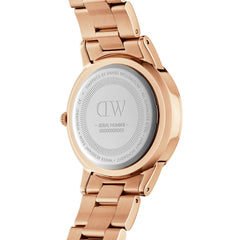 Close-up of the back of the Iconic Link Amber watch, showing the engraved Daniel Wellington branding on the stainless steel case and the polished rose gold link bracelet.