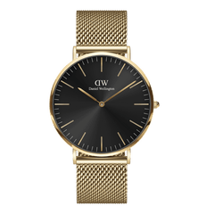 Gold mesh wristwatch with a black sunray dial, minimalist gold markers, and a slim round case, showcasing elegant and contemporary design.
