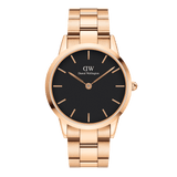 Daniel Wellington Iconic Link Rose Gold watch with black dial and polished rose gold stainless steel bracelet, unisex design.