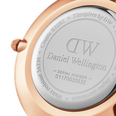 Back view of Daniel Wellington Petite Cornwall Rose Gold watch showing engraved caseback and rose gold stainless steel finish.