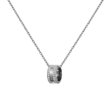 Polished silver necklace featuring a round pendant set with sparkling crystals, suspended from a delicate cable-style chain.
