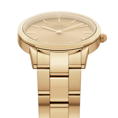 Daniel Wellington Iconic Link Unitone G gold women’s watch with minimalist dial and polished gold-tone link bracelet.