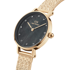 Elegant Petite Lumine Pressed Piano Gold women’s watch with black mother-of-pearl dial and gold mesh bracelet.
