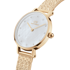 Gold Petite Lumine Pressed Piano women’s watch with white mother of pearl dial and crystal hour markers, piano-link strap.