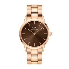 Daniel Wellington Iconic Link Amber watch featuring a polished rose gold stainless steel bracelet and a minimalist amber brown sunray dial.