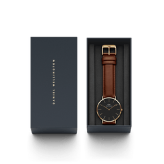Daniel Wellington Classic St Mawes Gold watch with brown leather strap in gift box, black dial and gold case.