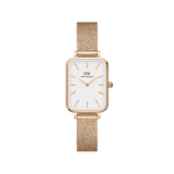 Rectangular rose gold watch with an eggshell white dial and a pressed mesh stainless steel strap, featuring minimalist hour markers and a slim, elegant case.