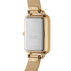 Close-up of the back of the Daniel Wellington Quadro Lumine Pressed Evergold watch, showing the stainless steel case, engraved branding, and gold mesh strap.