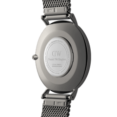 Back view of the Classic Mesh Arctic Silver watch showing the engraved caseback, stainless steel mesh strap, and secure clasp detail.