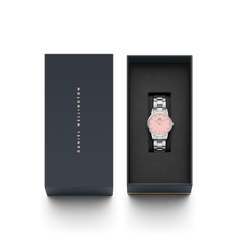 Daniel Wellington Iconic Link Blush watch with a pastel pink dial and silver link bracelet, presented in an elegant branded gift box.