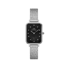 Rectangular silver women’s watch with black mother of pearl dial, crystal markers, and textured pressed piano link bracelet.