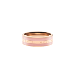 Rose gold Emalie Ring with a dusty rose enamel inlay and Daniel Wellington engraving, shown in a minimalist, side profile.