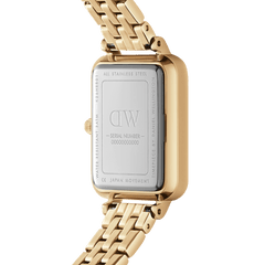 Back view of Quadro 5-Link Evergold women’s gold watch showing stainless steel case, serial number, and gold bracelet.