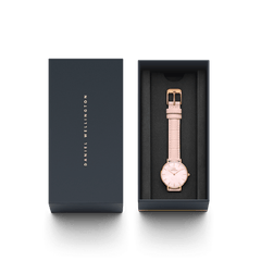 Petite Rouge Rose Gold women’s watch with pink leather strap in Daniel Wellington gift box, perfect for gifting.