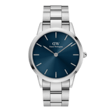 Daniel Wellington Iconic Link Arctic watch with a stainless steel bracelet and a vibrant blue sunray dial featuring minimalist silver markers.