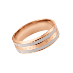 Rose gold band ring with a smooth desert sand enamel inlay and Daniel Wellington engraved along the polished surface.