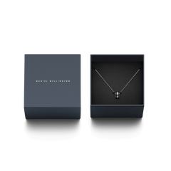 Emalie Necklace Silver Black displayed in an elegant Daniel Wellington gift box, featuring a polished silver chain and a black enamel ring pendant.