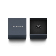 Elan Dual Ring Silver displayed in an open navy Daniel Wellington gift box, highlighting its dual band design and polished finish.