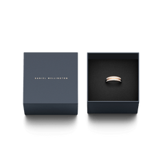 Emalie Ring Satin White Rose Gold presented in an elegant Daniel Wellington gift box, highlighting its rose gold and white enamel band.