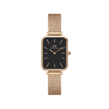 Rectangular rose gold women’s watch with a black dial and a pressed mesh stainless steel strap, featuring minimalist detailing and an elegant, contemporary design.