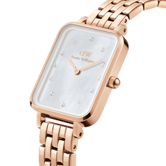 Quadro Lumine 5 Link Melrose White MoP Rose Gold watch featuring a rectangular rose gold case, iridescent white mother of pearl dial, and crystal hour markers on a polished five-link bracelet.