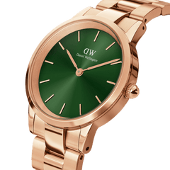 Daniel Wellington Iconic Link Emerald Green Rose Gold watch featuring a round emerald green dial, minimalist rose gold hour markers, and a polished rose gold link bracelet.